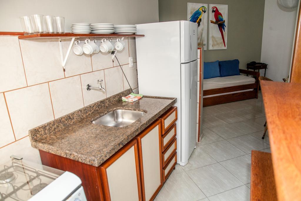 Отель Residencial Ilha Dourada Говернадор-Селсу-Рамус Номер фото