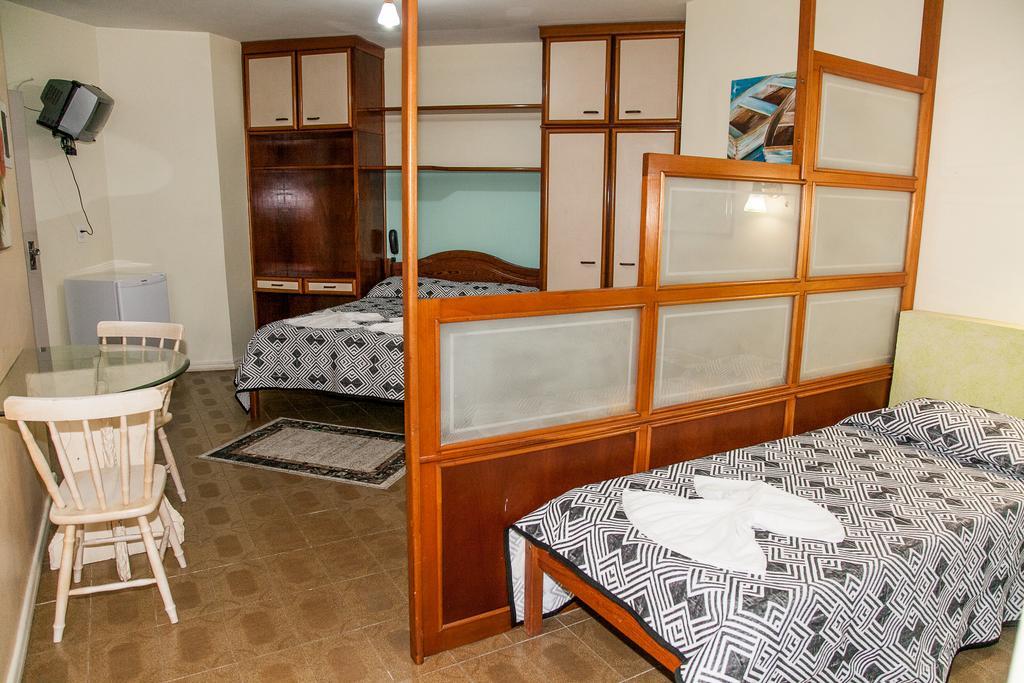 Отель Residencial Ilha Dourada Говернадор-Селсу-Рамус Номер фото